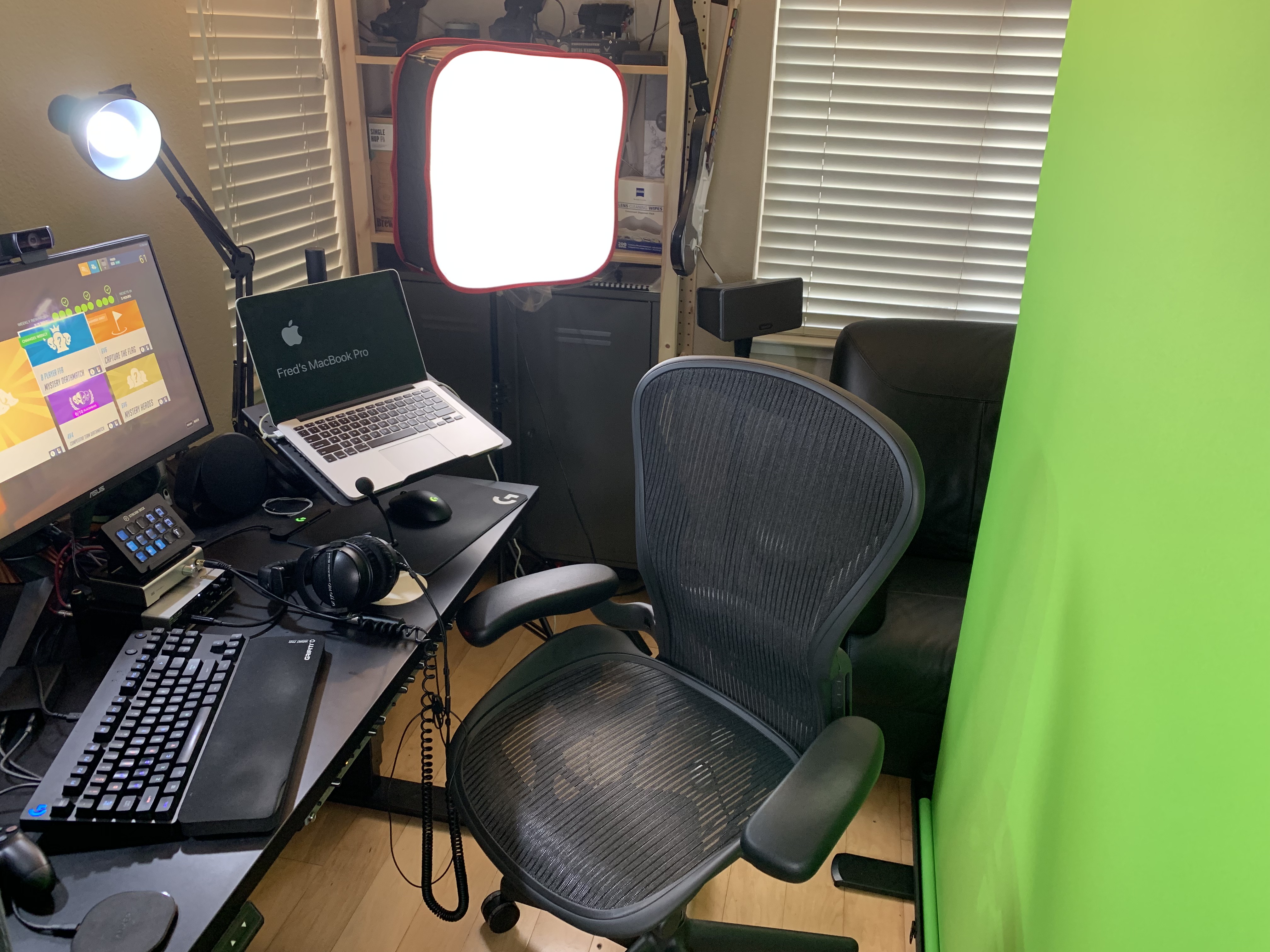 computer, green screen, cameras, and lights
